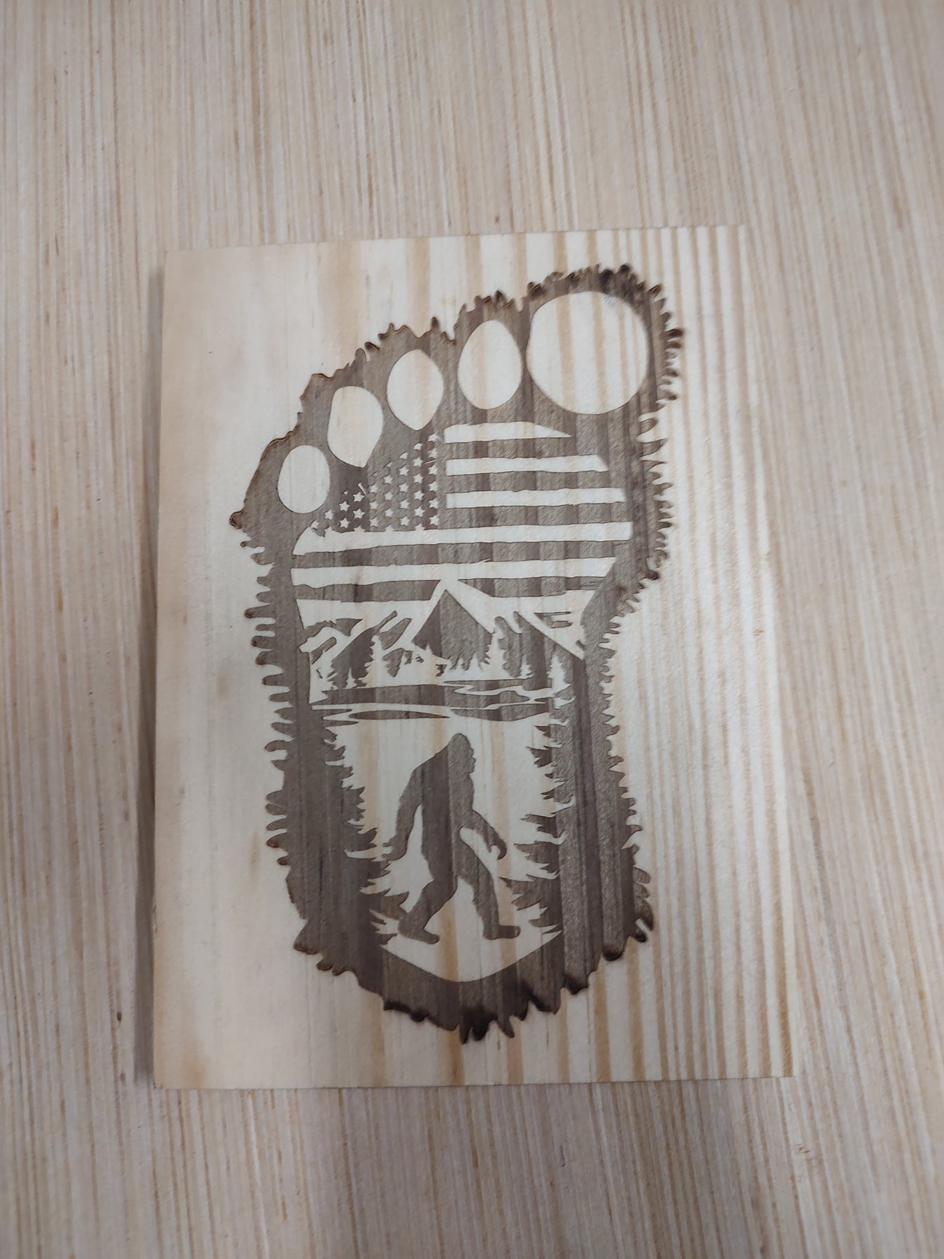 5" x 7" Pine Plaque Sign, Sasquatch & Flag footprint